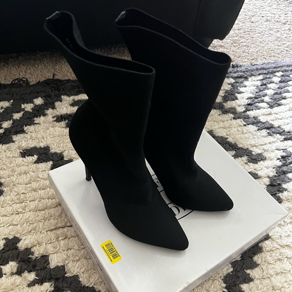 Steve Madden block knit high heel boots.